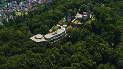 Wall Mural - Aerial view of the castle Burg Frankenstein close to the Mühltal in Germany. On a sunny day in Summer. Zoom in on the castle.