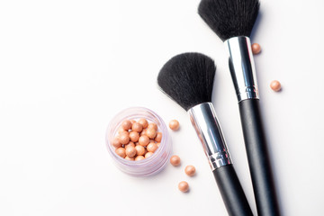 Professional makeup tools and blush meteorites, flatlay on white background