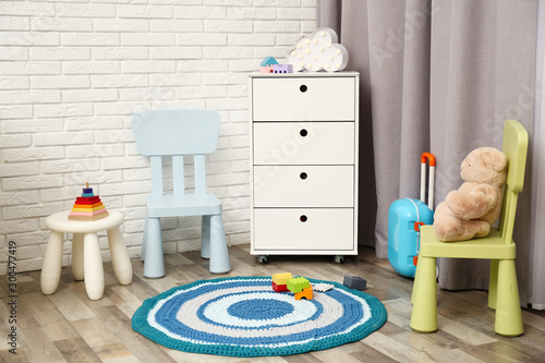 Modern Baby Room Interior With White Chest Of Drawers Buy This