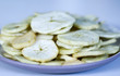 Apple chips on white background. 