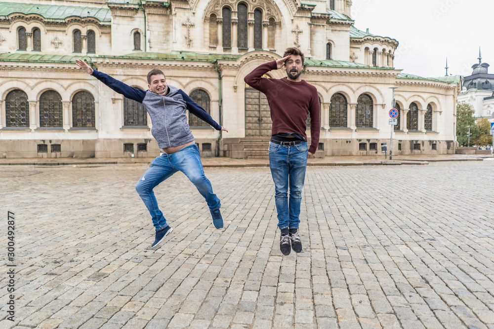 Obraz na płótnie Two crazy men jumping on the streets of Sofia. bulgaria w salonie