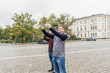 © photostocklight - Two young tourists taking photos with their mobiles in Sofia. Bulgaria