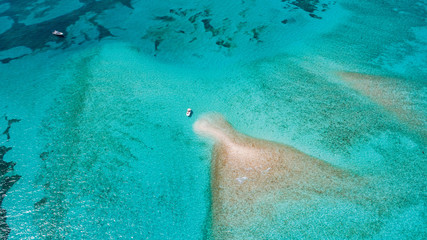 boat anchored Private Mermaid tail shaped Island in Florida Keys