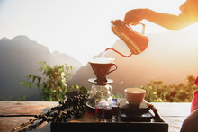 Drip Brewing, Filtered Coffee, Or Pour-over Is A Method Which Involves Pouring Water Over Roasted, Ground Coffee Beans Contained In A Filter. Breakfast Concept. - Image