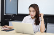 © tuiphotoengineer - Asian business women using notebook and  serious and headache for working