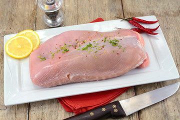 Wall Mural - raw chicken fillet on a plate