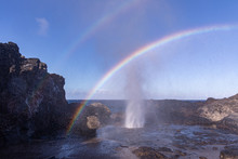 Double Rainbow Over Nakalele Blowhole. Sunrays Reflect On A Spray Coming From A Blowhole Creating Beautiful Color Stripes