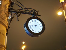 Big Street Clock At Night In St. Peterburg