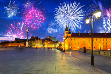 Wall Mural - Fireworks display over The Royal Castle  square of Warsaw, Poland