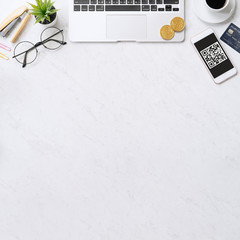 online payment with qr code concept, virtual credit card, smart phone on office laptop desk on clean