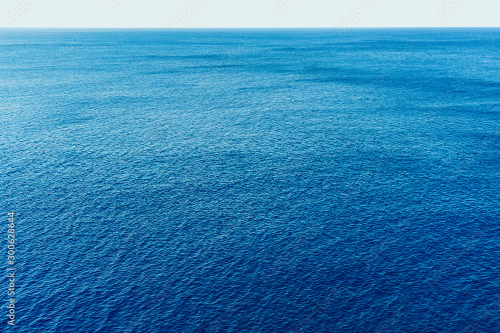 Blue sea surface with waves aerial view - obrazy, fototapety, plakaty 
