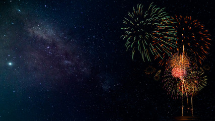 Wall Mural - fireworks with blur milky way background
