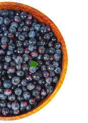 Poster - fresh blueberries in a wooden bowl