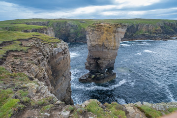 Stunning Yesnaby cliffs and the Yesnaby Castle Sea Stack on the west coast of Mainland Orkney island, Scotland