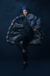 © Andrey Kiselev - jumping fashionable woman