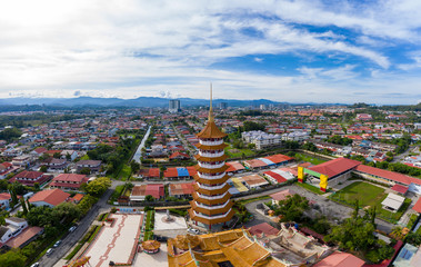 Canvas Print - Aerial view of Chinese Temple Peak Nam Toong Pagoda during Sunny day located in the city of Kota Kinabalu, Sabah, Malaysia.