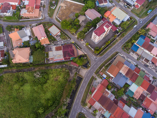 Canvas Print - Top down aerial drone image of roof tops houses at Kota Kinabalu City, Sabah, Malaysia