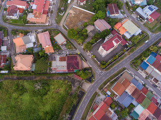 Wall Mural - Top down aerial drone image of roof tops houses at Kota Kinabalu City, Sabah, Malaysia