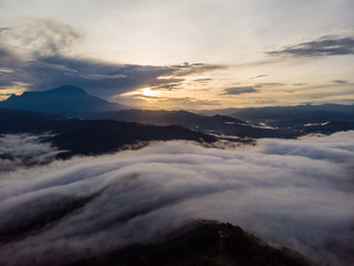 Canvas Print - Rural landscape with dramatic sea of cloud during sunrise with Mount Kinabalu at Saba, Borneo