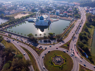 Bird eyes view of beautiful Kota Kinabalu mosque, famous landmark in Kota Kinabalu with clear blue sky during sunny day at Kota Kinabalu, Sabah, Borneo