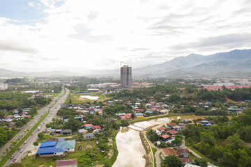 Canvas Print - Aerial drone image of beautiful rural town local lifestyle houses residential of Menggatal Town, Sabah, Malaysia