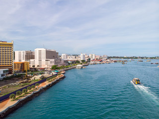 Sticker - Kota Kinabalu cityscape aerial  photo with fisherman boat parking at Waterfront Kota Kinabalu. Kota Kinabalu is the capital of Malaysia’s Sabah state.