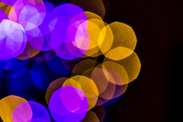 Colourful Christmas lights bokeh background.