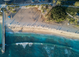 Wall Mural - Aerial drone shot view of Waikiki beach in Honolulu in Hawaii in summer time
