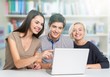 © BillionPhotos.com - Group of Students with computer at lesson in classroom