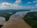 Fototapeta Natura - Beautiful aerial view of the Tempisque river and the Amistad bridge in Costa Rica
