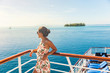 © Maridav - Cruise ship travel vacation woman looking at ocean from deck of sailing boat. Luxury Tahiti Bora Bora French Polynesia destination summer lifestyle.