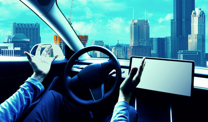 Wall Mural - Person using a car in autopilot mode hands free