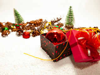 Christmas composition with gift box and decorations