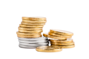 Stack of gold and silver coins close-up. Stack of gold and silver coins close-up.