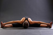 Girl stretching. woman practice yoga upavistha konasana or seated wide angle pose to meditation. Upavishtha, straddle, dragonfly yoga posture.