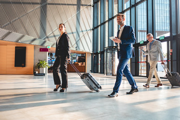 business people at airport hall