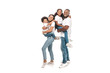 © LIGHTFIELD STUDIOS - happy african american woman holding son, and husband holding daughter on white background