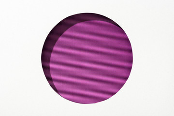 Canvas Print - cut out round hole in white paper on striped purple background