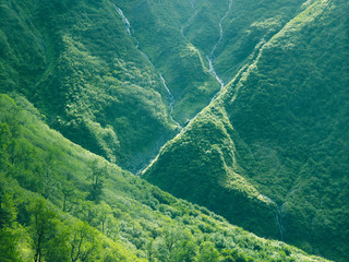 Wall Mural - Streams Of Glacial Water On The Mountain Side. Mountainous Landscape Near Juneau, AK