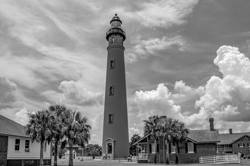 Panoramic view of historic lighthouse on lightblue sky cloudy background 2