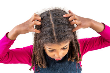 girl itchy his hair on isolated w indoors background, health care concept