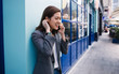 © BullRun - Contemporary young ethnic businesswoman talking on smartphone