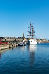 view of the Sea Cloud II luxury cruise ship in the port of Saint-Malo on the coast of Brittany