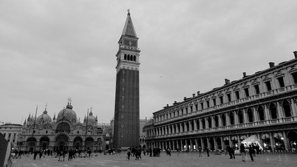 Black and white photo of bell tower of St Mark's Campanile taken in the beautiful city of Venice, Italy