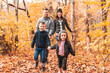 © Louis-Paul Photo - A portrait of a young family in the autumn park