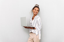 Happy Positive Young African Business Woman With Dreads Isolated Over White Wall Background Using Laptop Computer.