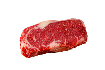 Wall Mural - A rib eye steak of marbled grain-fed beef lies on a white background. Isolated.