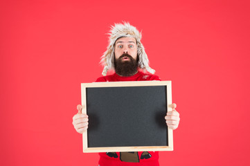 Poster - Promotion. Winter event. Winter holiday. Schedule timing concept. Seasonal offer. Presentation concept. Winter announcement. Bearded man blank blackboard copy space. Chalkboard for information