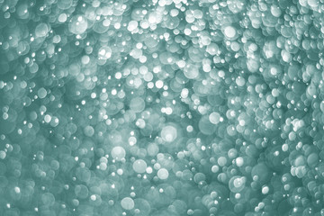 Wall Mural - green bokeh abstract luxury background or air bubble wallpaper. lights effect for backgrounds and wa