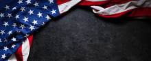 US American Flag On Worn Black Background. For USA Memorial Day, Veteran's Day, Labor Day, Or 4th Of July Celebration. With Blank Space For Text.
